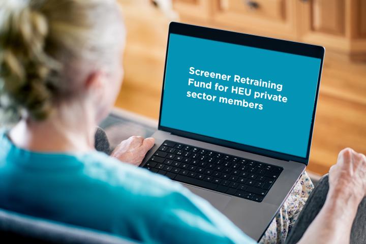 woman watching video on laptop