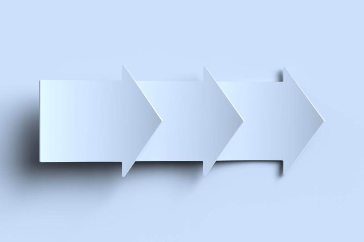 arrows cut from paper