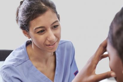 Health care worker listening in support