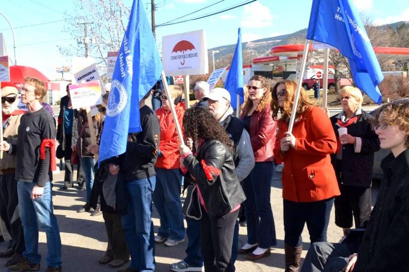 Nearly 80 Kamloopsians rally against $5-billion federal cuts to health care in B.C.